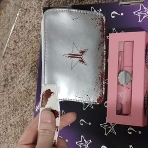 Jeffree Star cosmetics mascara and cleaver wristlet